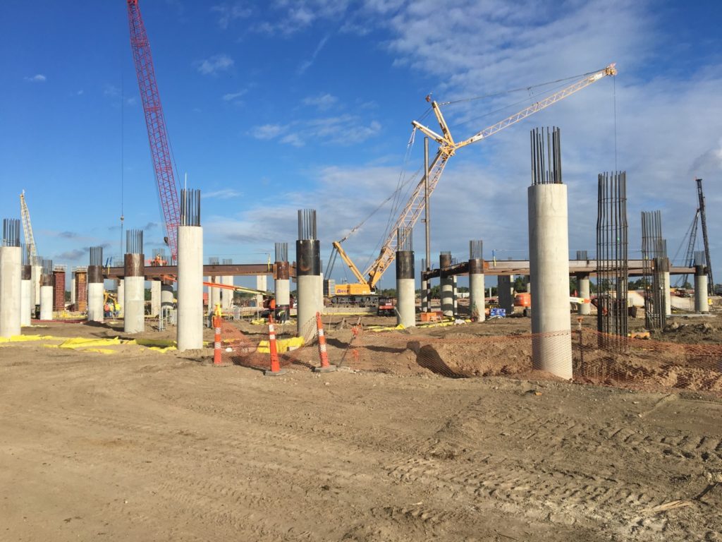 Piles being driven at the construction site via flymsy.com's October Board Update.